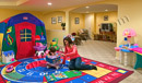 Like this finished basement near Audobon, PA, keeping the kid's play room open to other spaces is a key component to a successful finished basement design.